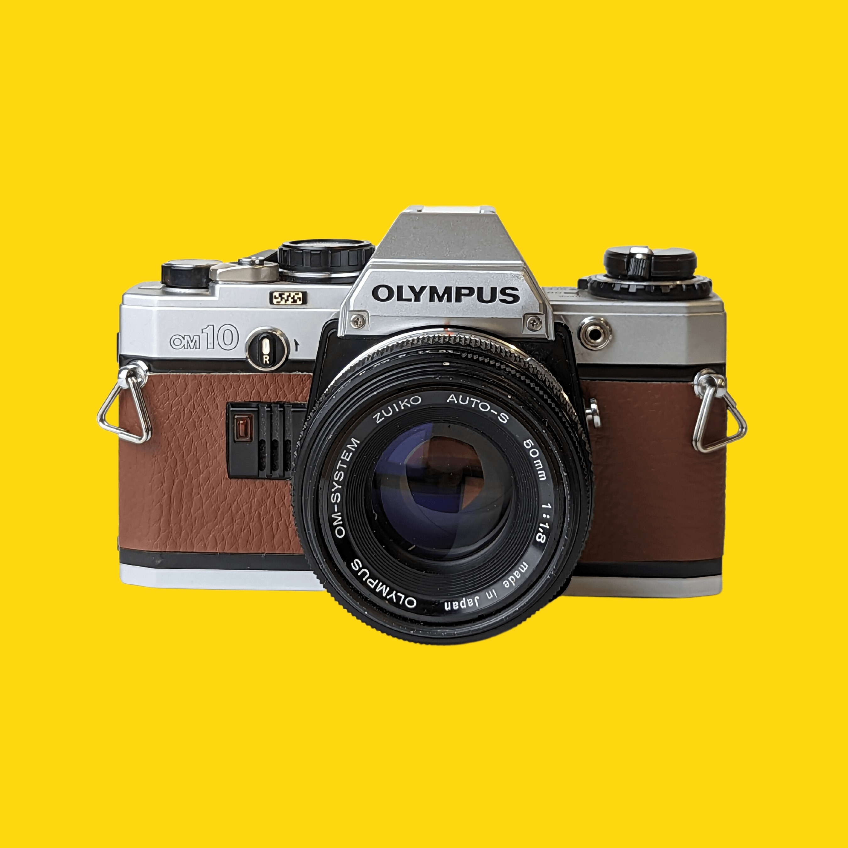 Olympe, Olympus OM10 Caméra 35mm Vintage en cuir marron avec objectif F/1.8 50mm