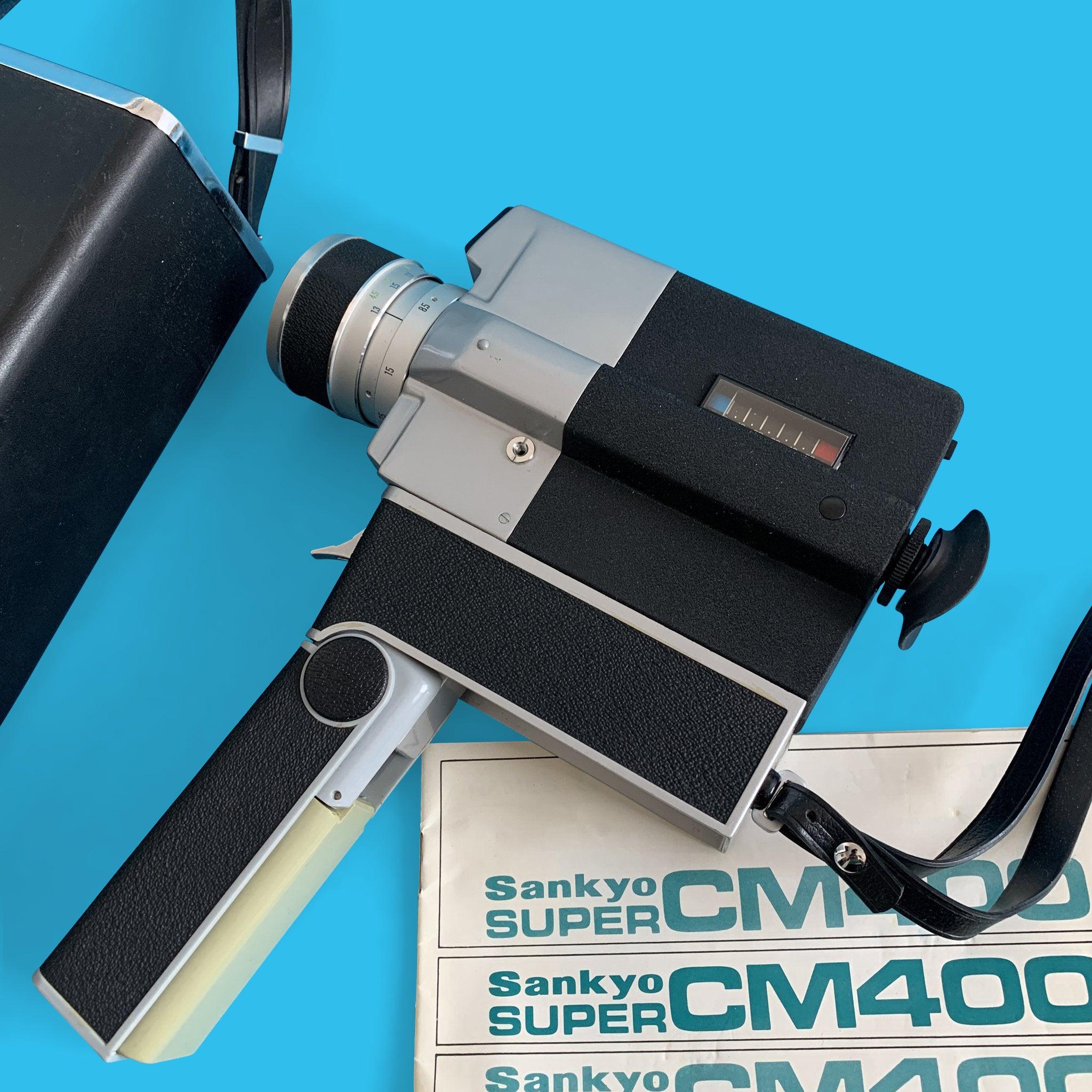 Sankyo, Sankyo Super CM 400 Movie Cine Camera avec instructions et étui en cuir